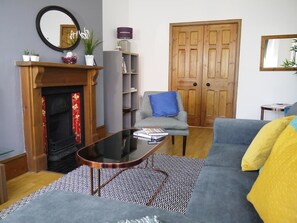 One-Bedroom Apartment | Living area | Flat-screen TV