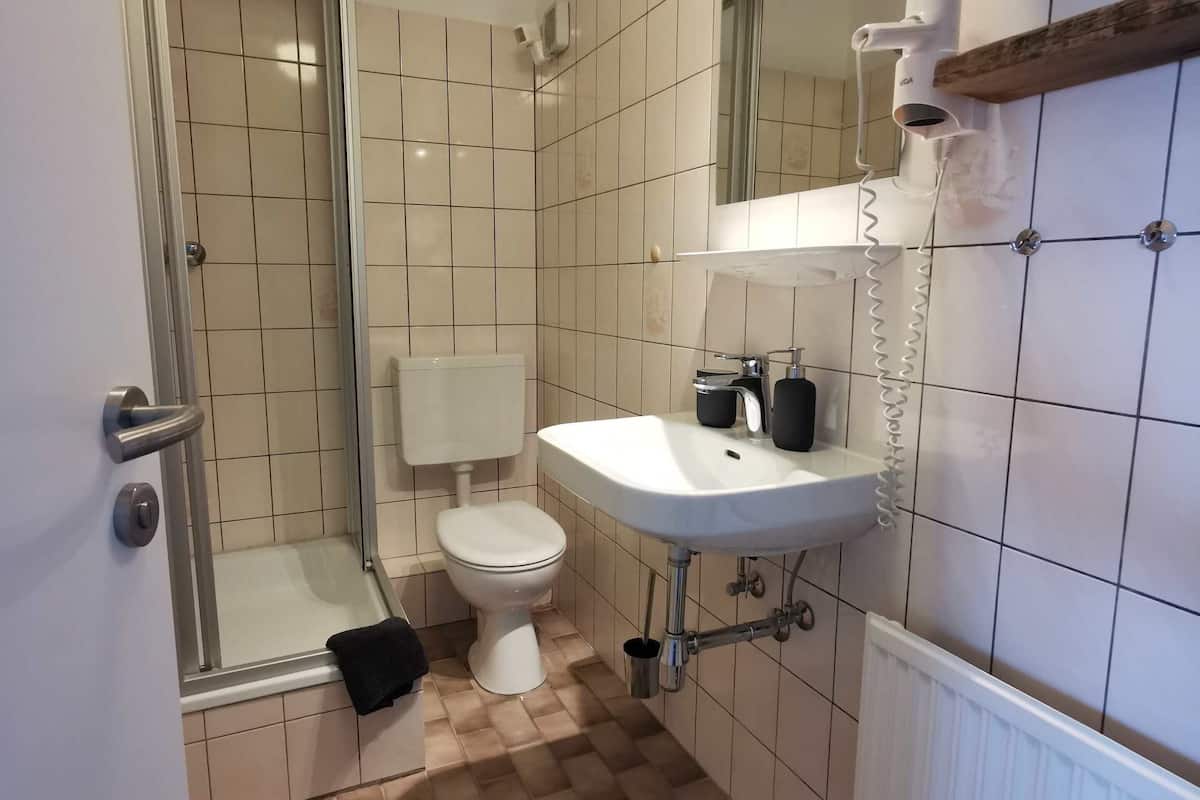 family room | bathroom | shower, hair dryer, towels