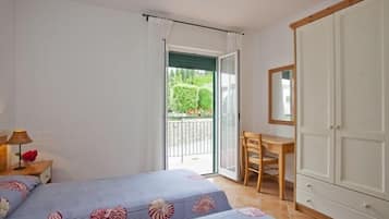 Apartemen, 2 kamar tidur | 1 kamar tidur, seprai premium, brankas, dan tirai kedap cahaya