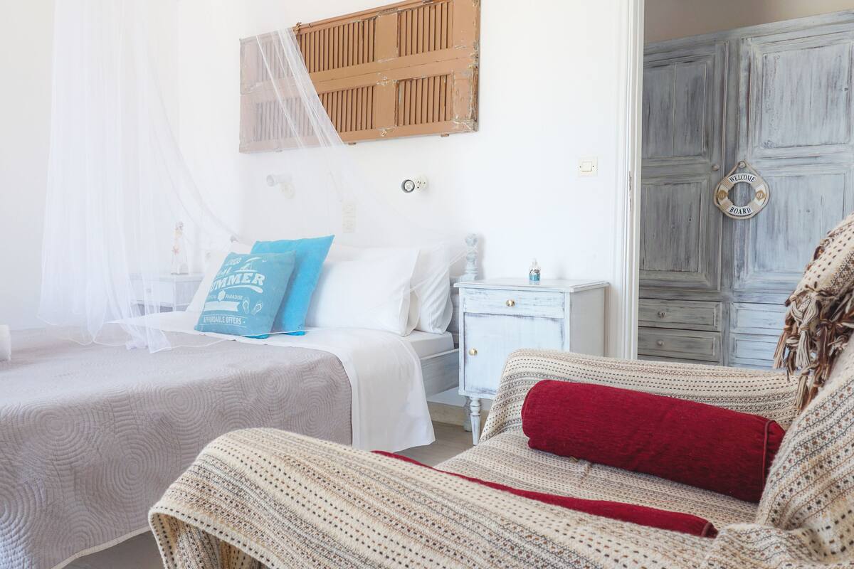 Quadruple Room, Garden View, Ground Floor | In-room safe, individually decorated, individually furnished, desk
