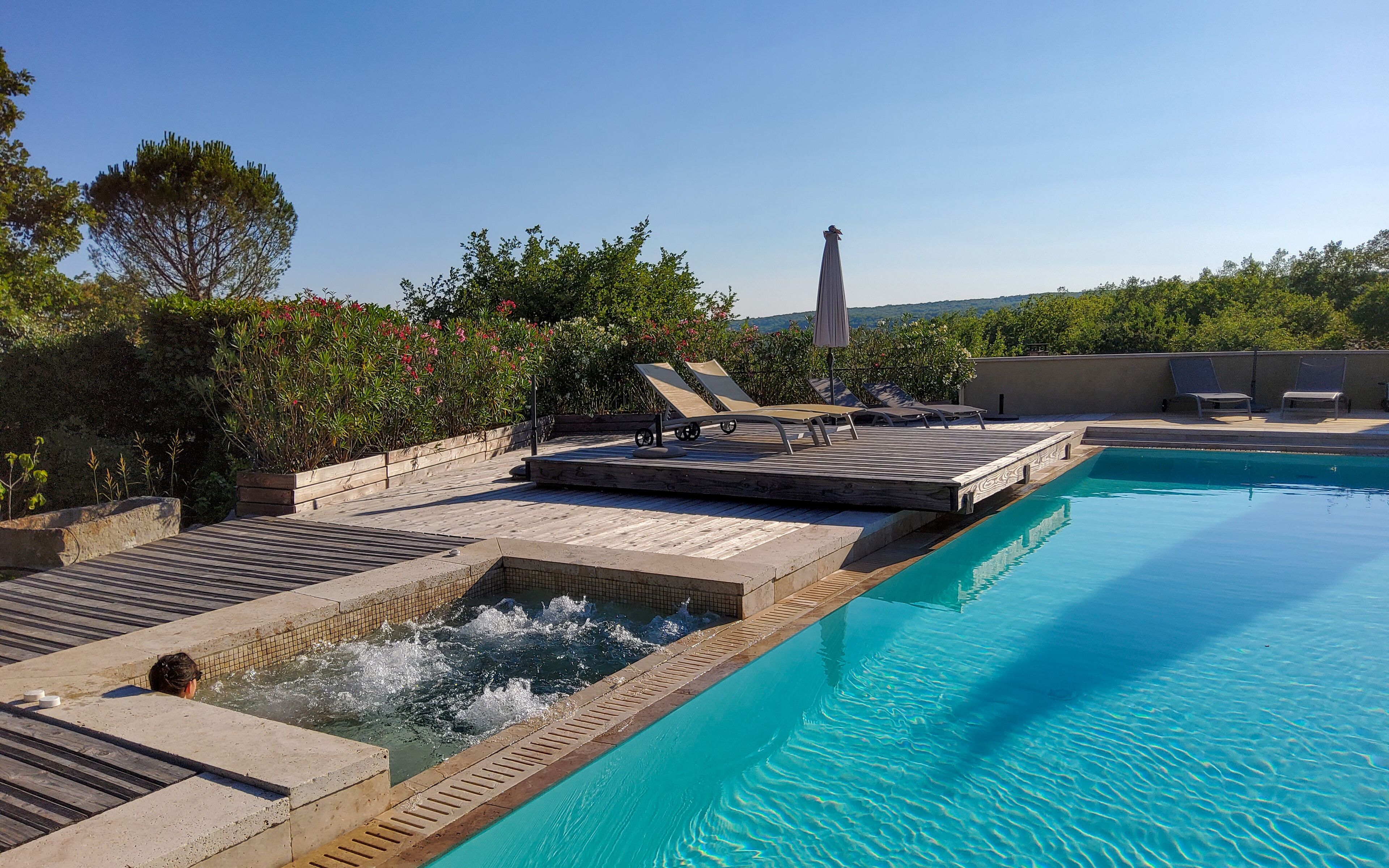 Outdoor pool, pool umbrellas, pool loungers