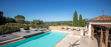 Outdoor pool, pool umbrellas, pool loungers