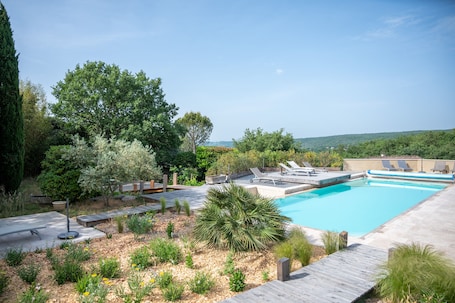 Outdoor pool, pool umbrellas, sun loungers