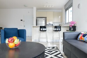 Apartment, 3 Bedrooms | Living room | Flat-screen TV - 3 BDR Balcony W Parking by Banana Beach (Tel Aviv)