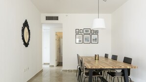 Apartment, 3 Bedrooms | In-room dining - 3 BDR Balcony W Parking by Banana Beach (Tel Aviv)