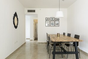 Apartment, 3 Bedrooms | In-room dining - 3 BDR Balcony W Parking by Banana Beach (Tel Aviv)