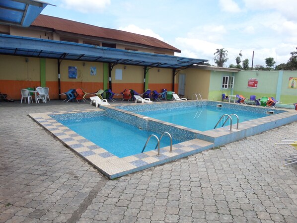 Outdoor pool, pool umbrellas, pool loungers
