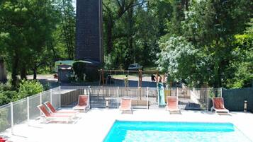 Seasonal outdoor pool, pool loungers