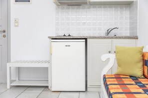 Quarto casal | Cozinha privada | Geladeira grande, fogão, cooktop, chaleira elétrica