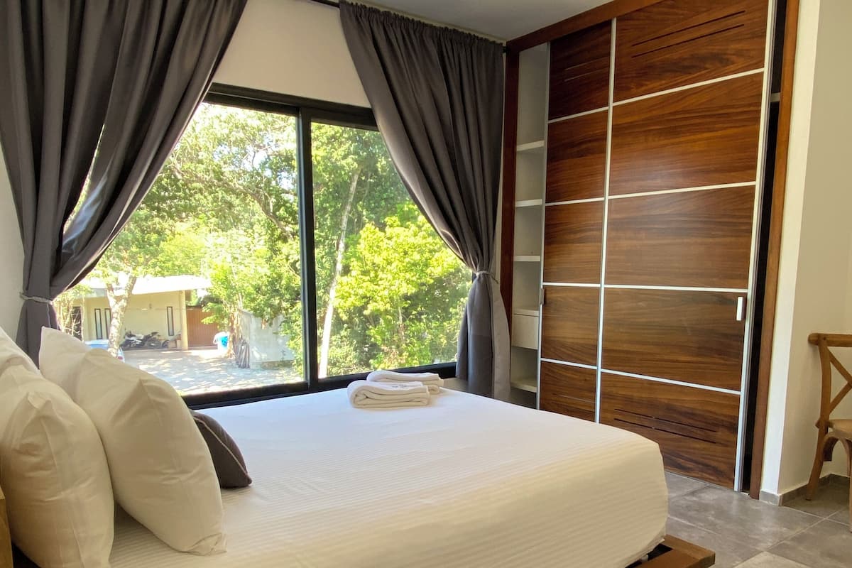 Deluxe suite, 2 slaapkamers | 2 slaapkamers, lakens van Egyptisch katoen, luxe beddengoed