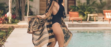 2 outdoor pools, open 7:00 AM to 10:30 PM, pool loungers