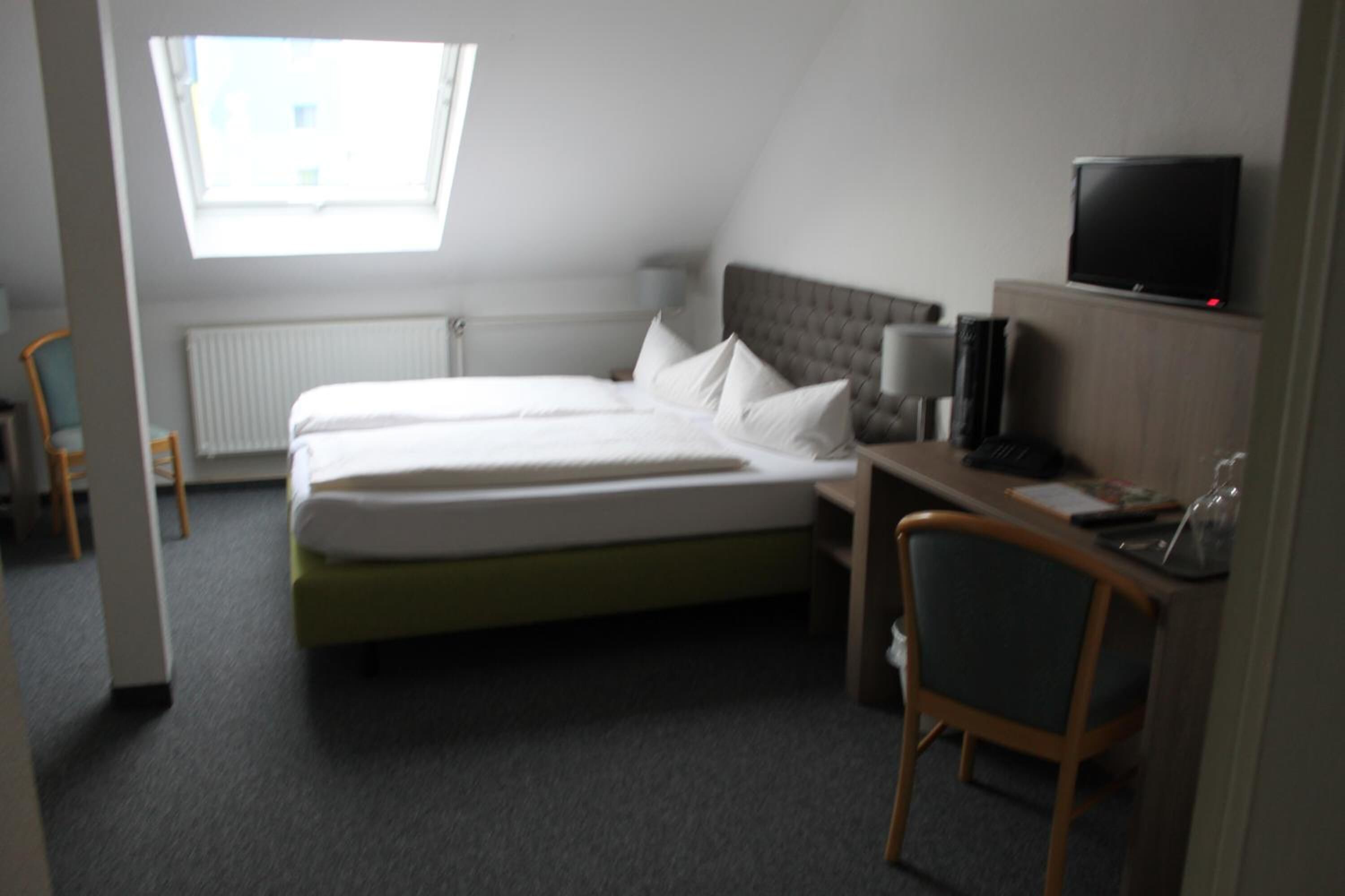 Hypo-allergenic bedding, desk, laptop workspace, free WiFi