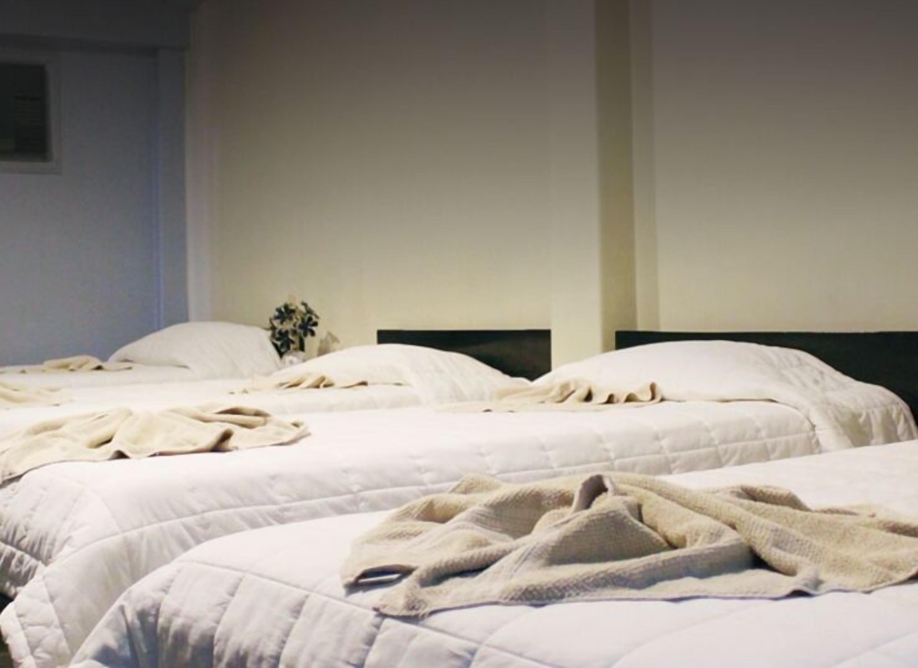 Quadruple Room, 1 Bedroom, Non Smoking, Private Bathroom | Minibar, in-room safe, blackout curtains, soundproofing