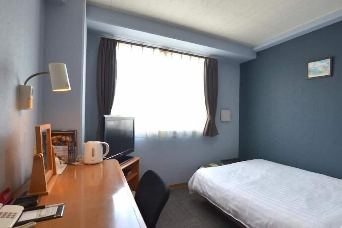 Fer et planche à repasser, accès au Wi-Fi (inclus)