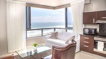 Family Apartment, 2 Bedrooms | Living room | Flat-screen TV