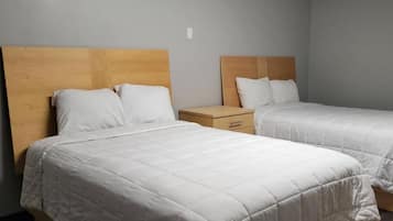 Habitación Deluxe, 2 camas Queen size | Minibar, escritorio, tabla de planchar con plancha y wifi gratis