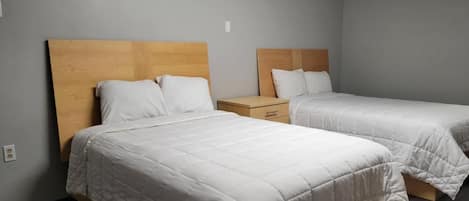 Deluxe Room, 2 Queen Beds | Minibar, desk, iron/ironing board, free WiFi