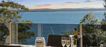 Perched above Dutchies Beach with views over the bay