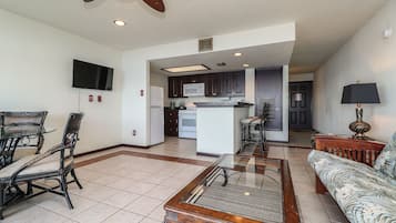 Signature Condo, 1 Bedroom, Balcony, Lake View | Living area | 48-inch Smart TV with cable channels, TV, Netflix