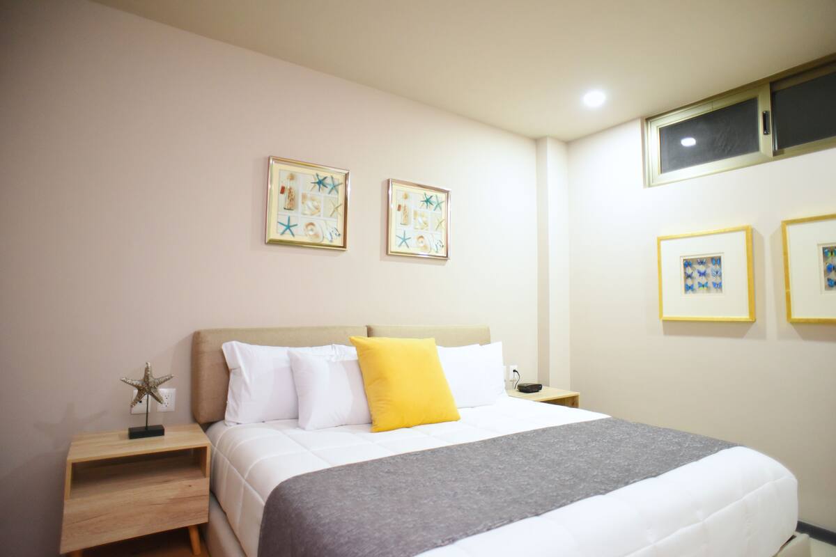 Standard Suite, 1 King Bed, Non Smoking | Laptop workspace, iron/ironing board, free WiFi