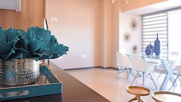 Deluxe Suite, 2 Bedrooms, Non Smoking | Living area | Flat-screen TV