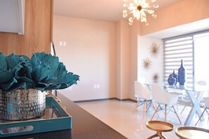 Deluxe Suite, 2 Bedrooms, Non Smoking | Living area | Flat-screen TV - Marina Suites (Mazatlán)