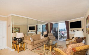 House, Multiple Beds (Pier View Escape) | Living area | TV, fireplace, DVD player, table tennis