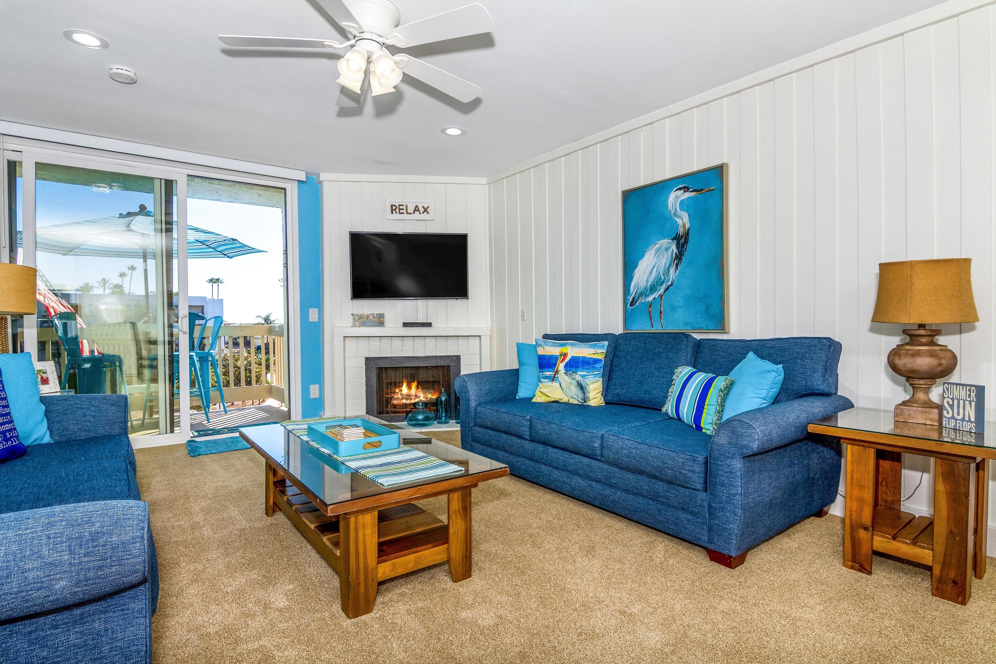 House, Multiple Beds (Sea Breeze Penthouse) | Living area | TV, fireplace, DVD player