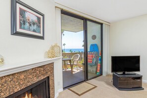 Condo, Multiple Beds | Living area | TV, fireplace, DVD player, ping pong - Fun in The Sun (Oceanside)