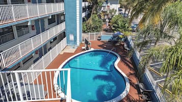 Outdoor pool, open 7:00 AM to 7:00 PM, sun loungers