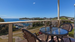Outdoor dining - A top floor unit with panoramic views over the marina (Nelson Bay)