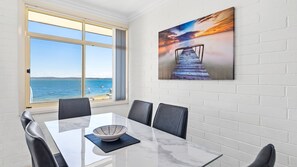 6 seater dinning table with a great beach view