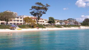 Beach - A modern apartment with waterviews across Shoal Bay (Shoal Bay)