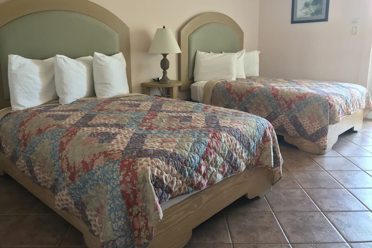 Deluxe Double Room Single Use, 2 Double Beds, Ocean View | Blackout drapes, iron/ironing board, free WiFi, bed sheets