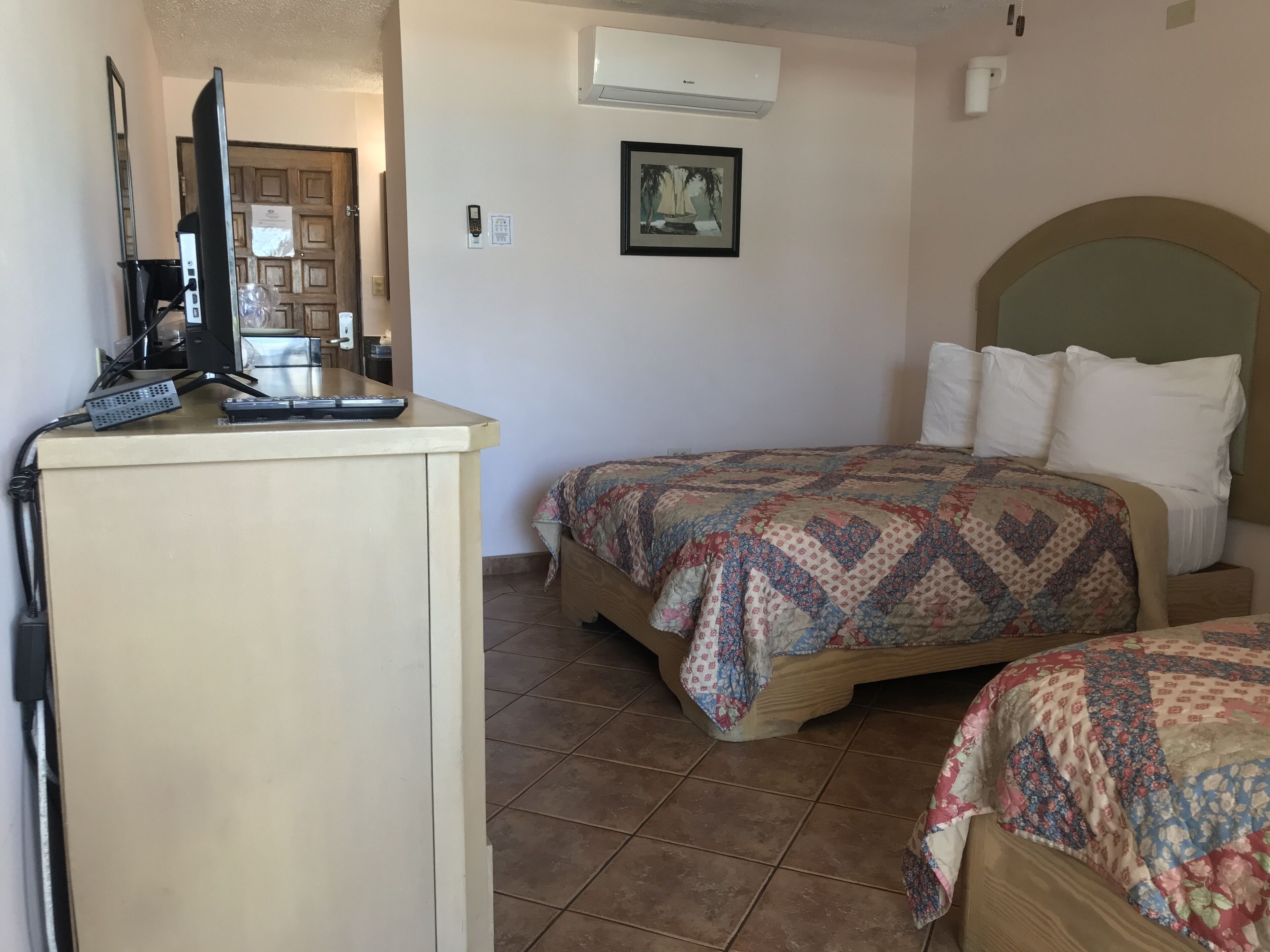deluxe double room single use, 2 double beds, ocean view | 1 bedroom, blackout curtains, iron/ironing board, free wifi