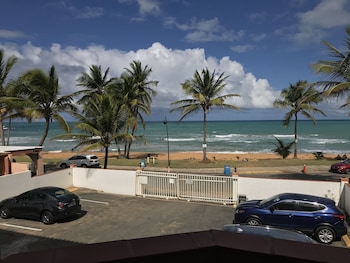 Blackout drapes, iron/ironing board, free WiFi, bed sheets at Luquillo Sunrise beach Inn