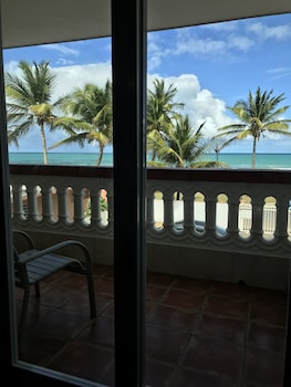Hotel room view looking out at Luquillo Sunrise beach Inn