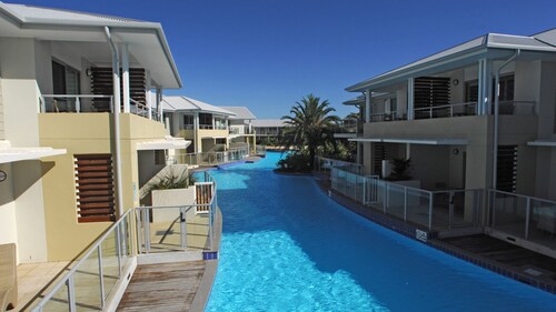 A modern, swim out apartment with access to all the resort facilities