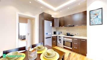 Apartemen Basic | Dapur pribadi | Lemari es, microwave, kompor, dan penanak nasi