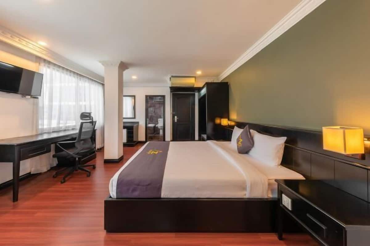 Frigobar, escrivaninha, Wi-Fi de cortesia, roupa de cama