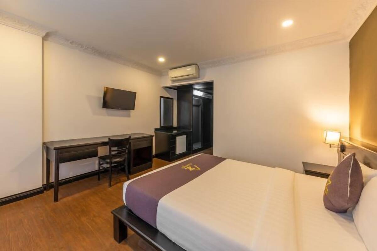 Frigobar, escrivaninha, Wi-Fi de cortesia, roupa de cama