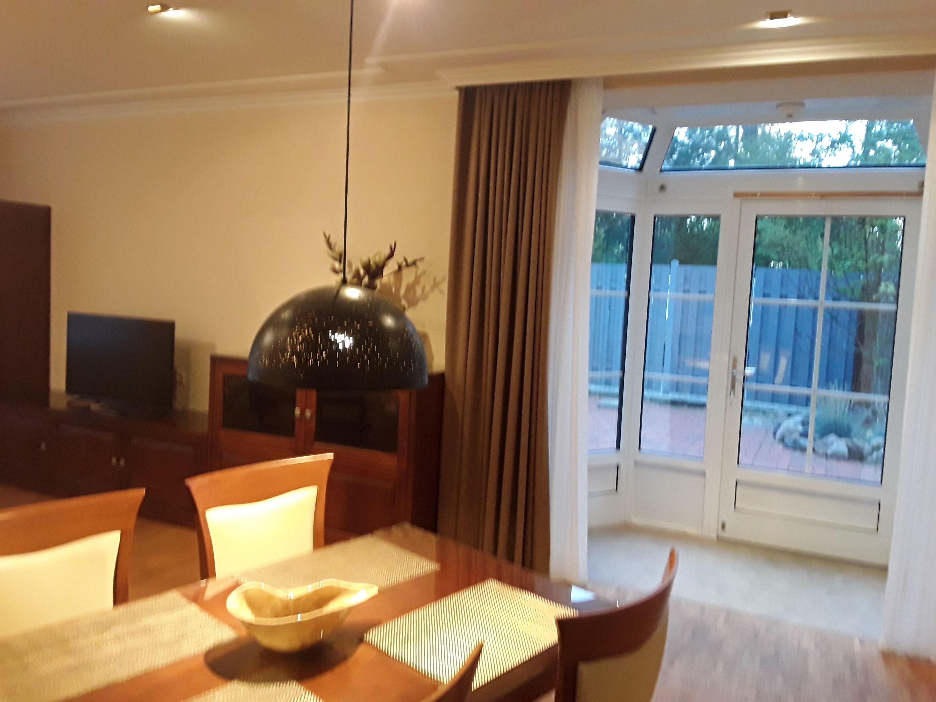 comfort quadruple room, multiple beds, non smoking, bathtub | living area | 100-cm plasma tv with cable channels, tv