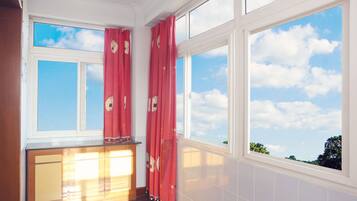 Quadruple Room (Shared Bathroom ) | Blackout drapes, free WiFi, bed sheets