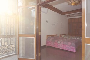 Kamar Quadruple, 2 Tempat Tidur Double | Tirai kedap cahaya, Wi-Fi gratis, dan seprai linen