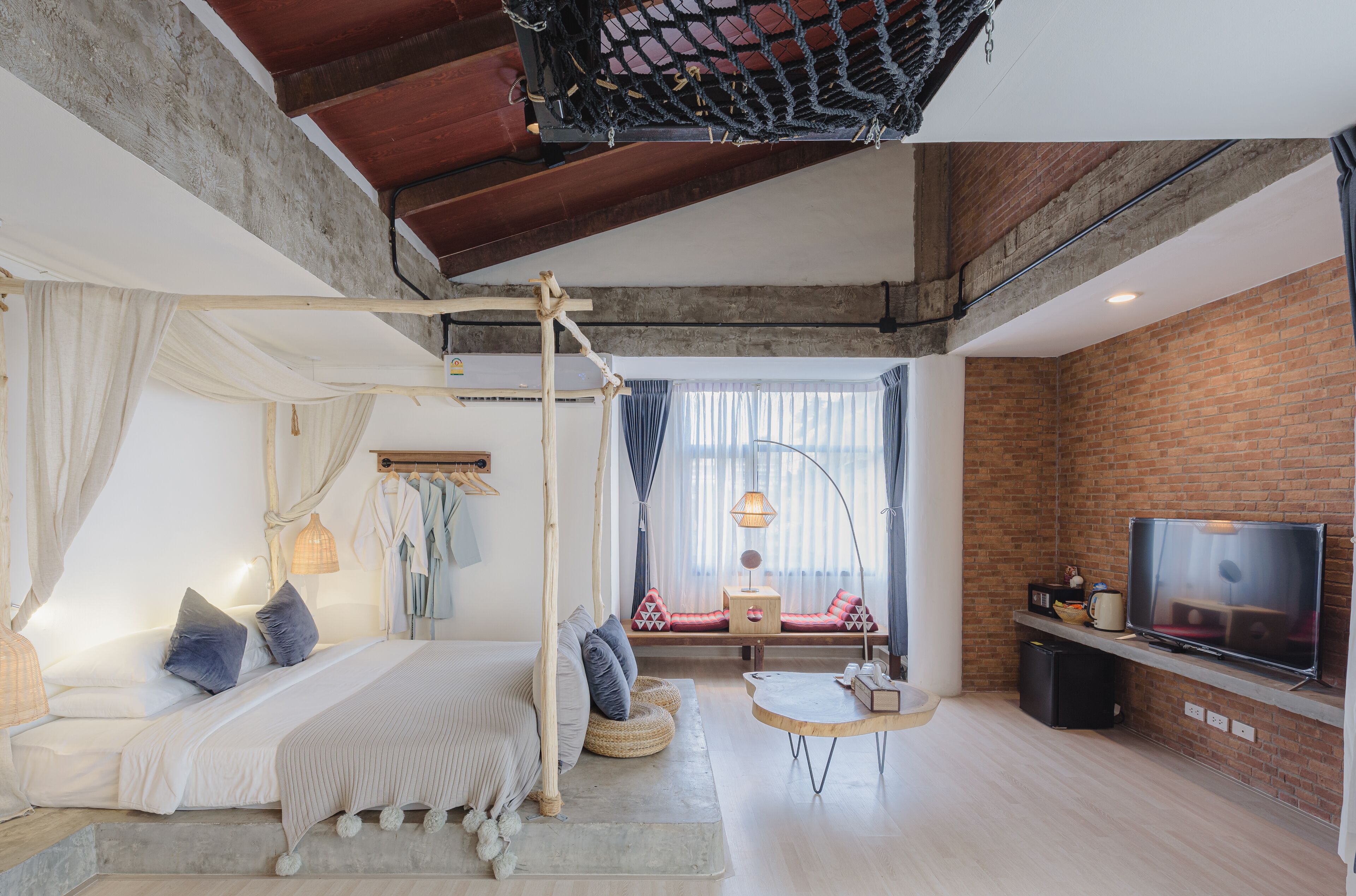 signature loft, 1 bedroom, non smoking, bathtub | living area | flat-screen tv