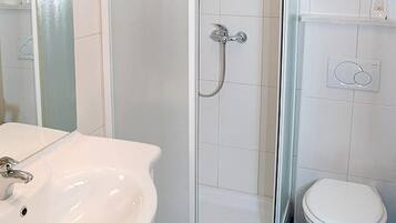 Shower, free toiletries, hair dryer, towels