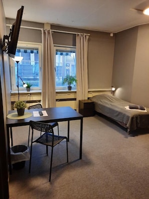 Blackout drapes, iron/ironing board, free WiFi, bed sheets