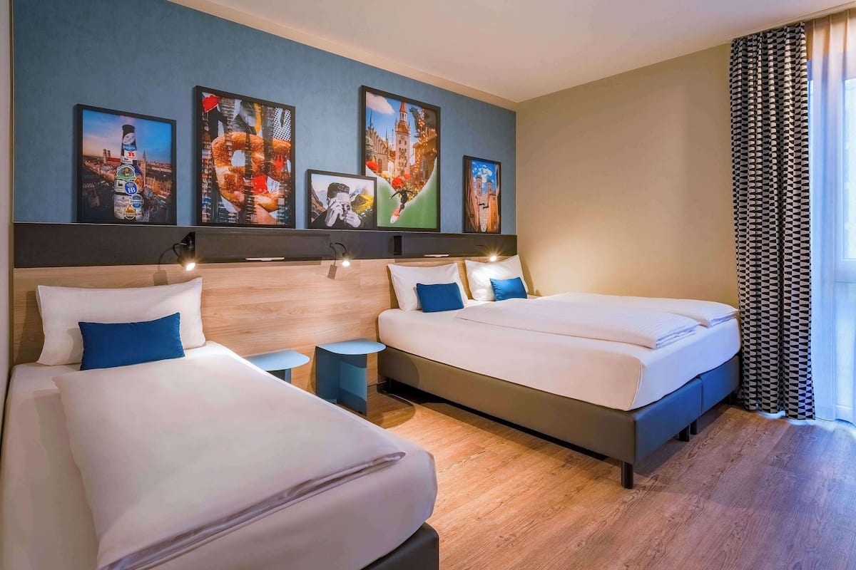 Deluxe Room, 3 Twin Beds | Desk, laptop workspace, blackout drapes, soundproofing