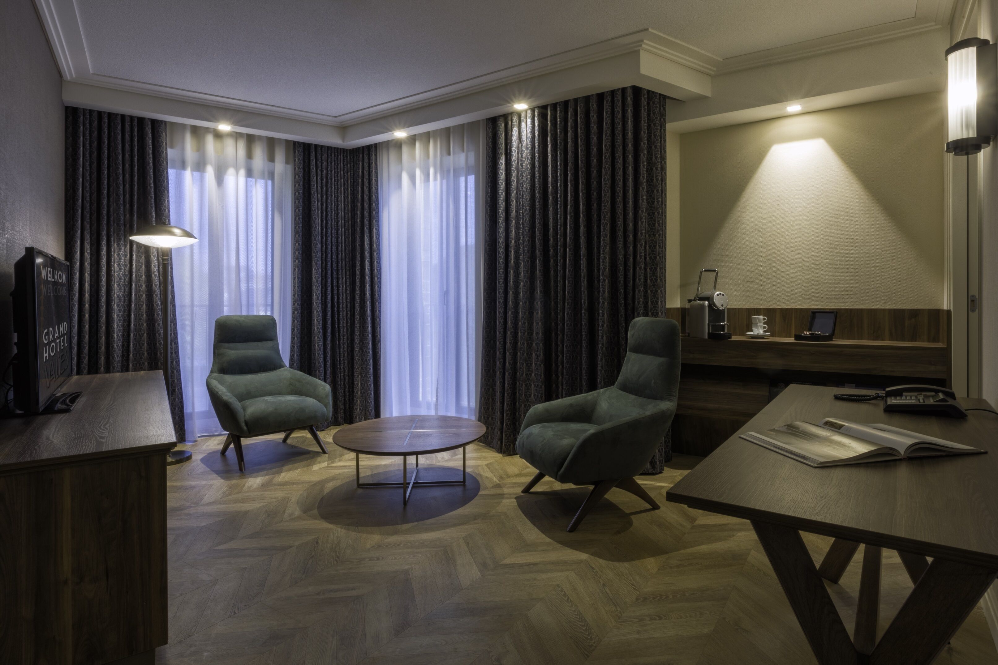 executive suite | living room | 43-inch flat-screen tv with satellite channels, tv, heated floors