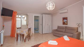 Suite superior, terraza | Escritorio, sistema de insonorización, camas supletorias y wifi gratis